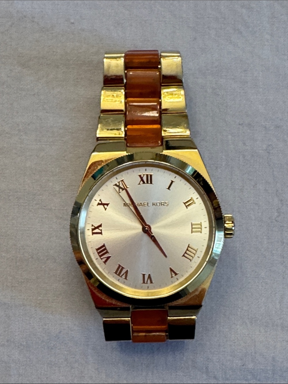 Michael Kors womans Gold and Brown Analog Bracelet Watch